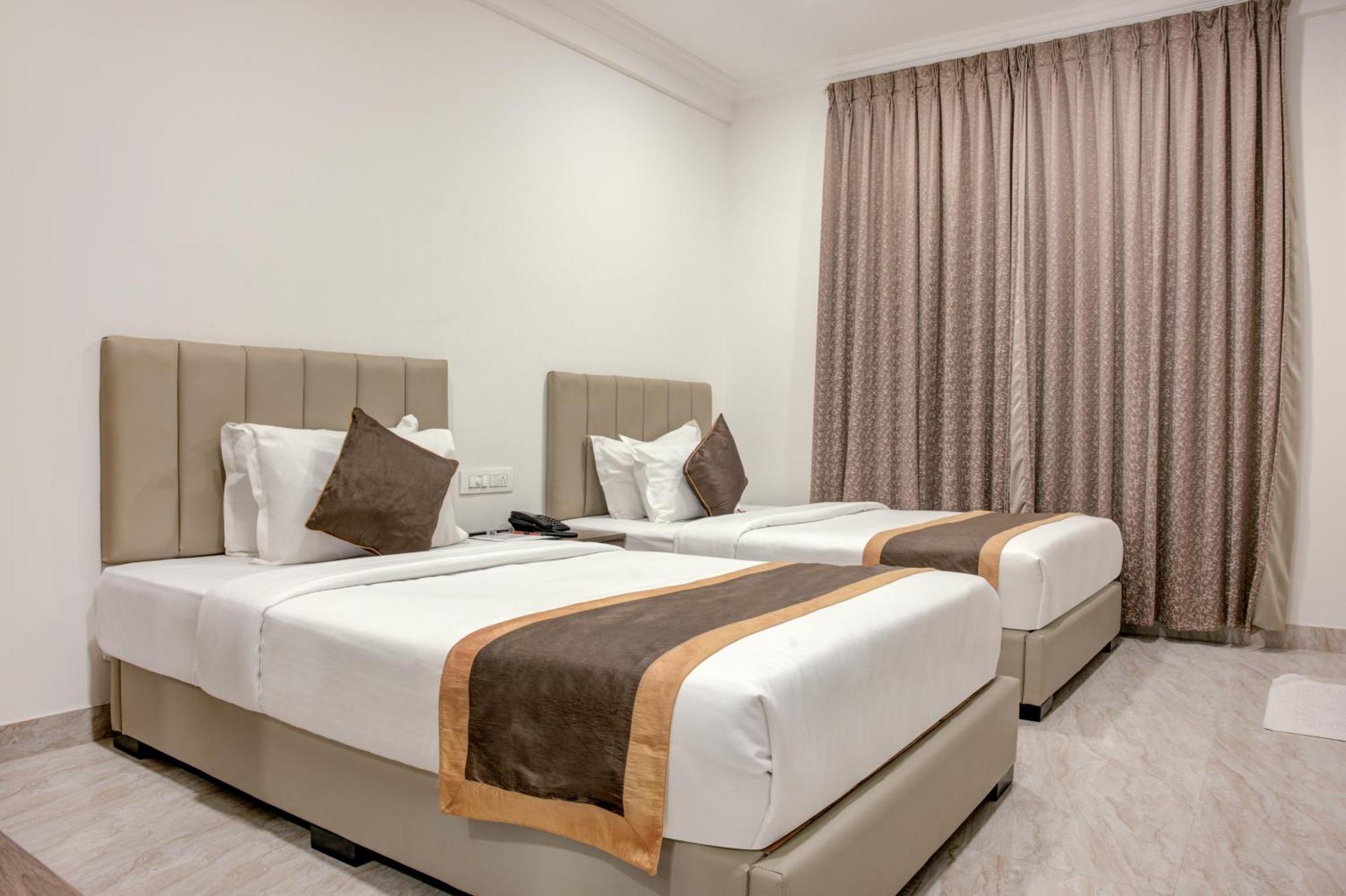 Hotel Sterling Inn Bangalore International Airport Yelahanka Exterior photo